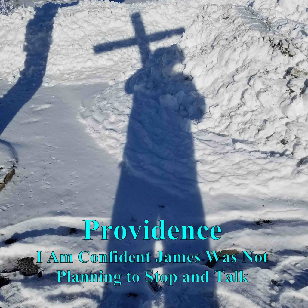 Providence: Shadow in the snow of Tony holding his cross